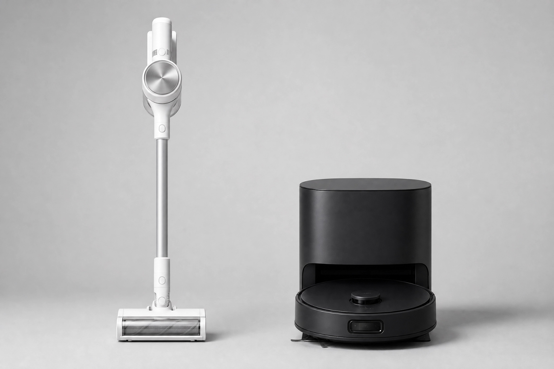 Side-by-side comparison of a cordless stick vacuum and a robot vacuum with docking station